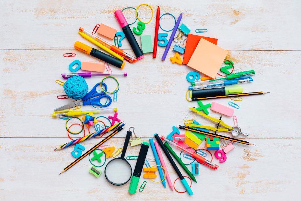 A variety of stationery items including pens, staples, folders, and all school or office essentials.